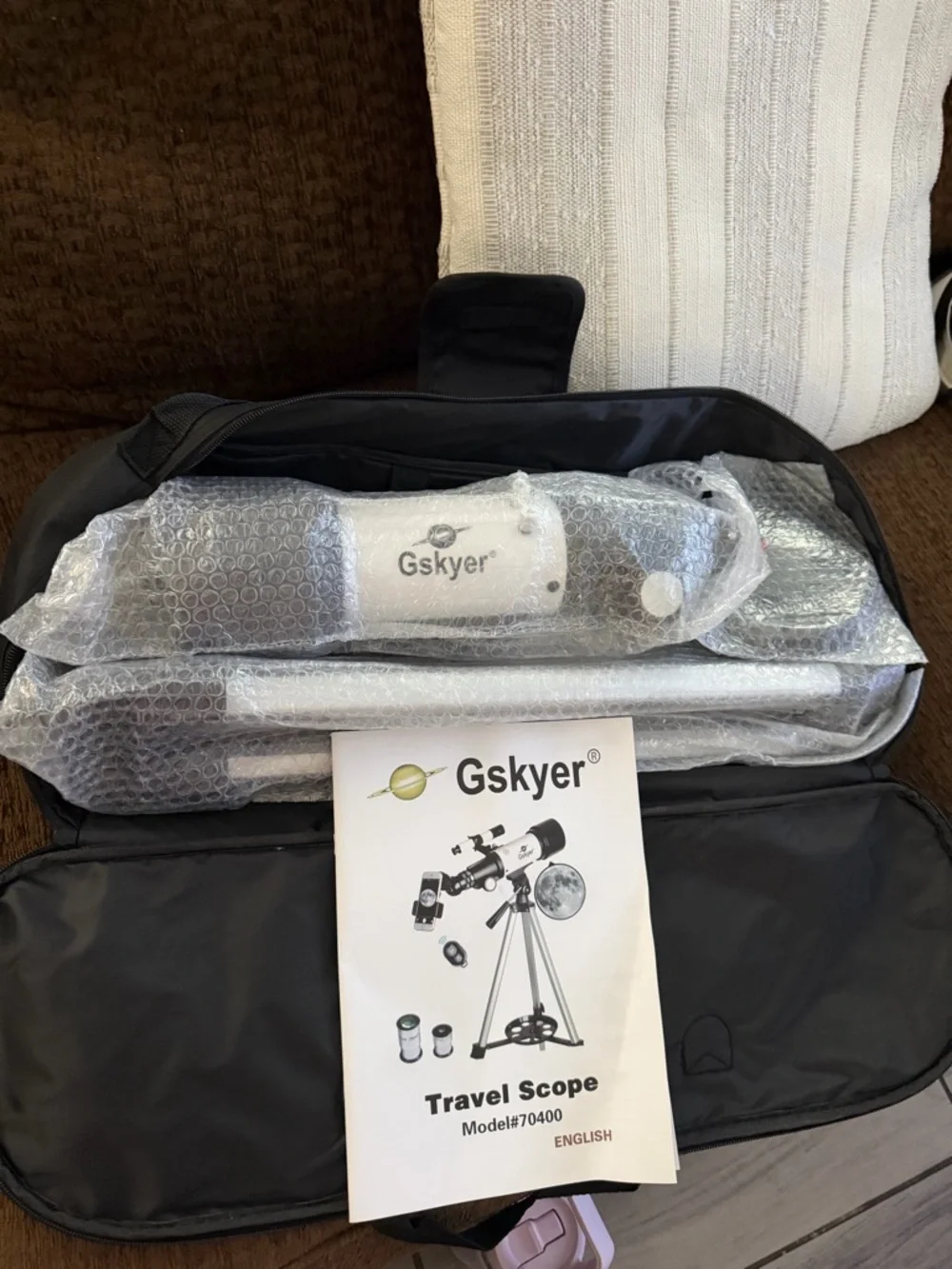 White and Black Refractor Telescope with Smartphone Adapter